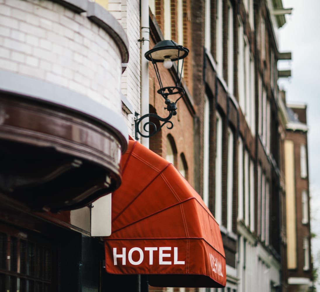 The hotel's red awning above the street